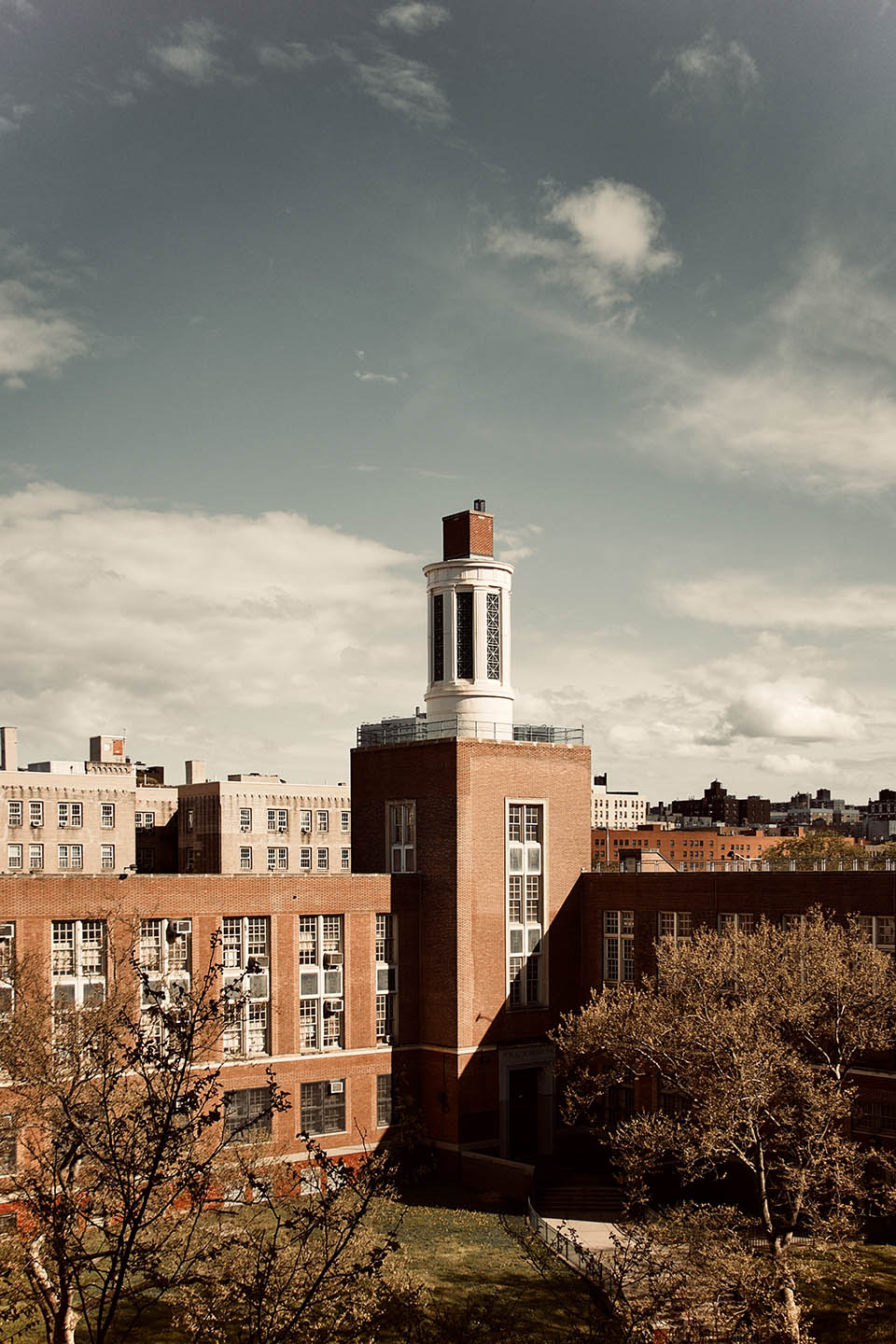 brown and white concrete building under blue sky during daytime